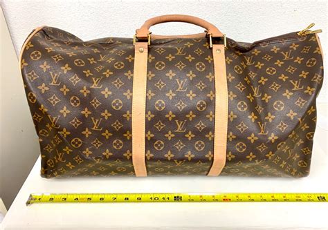 louis duffle bag fake|duffle bag louis vuitton.